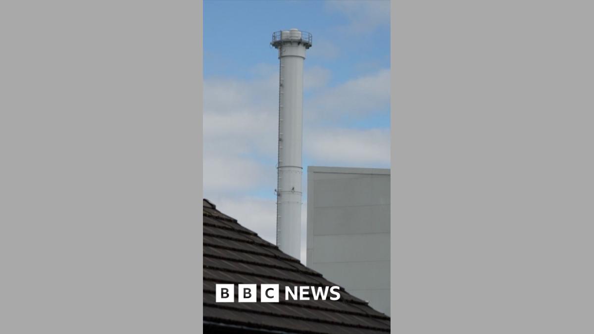 A chimney of a waste plant building.