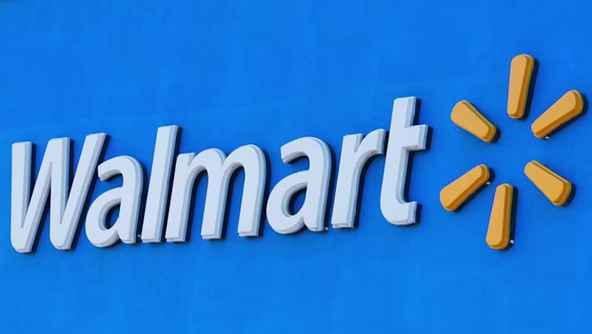 FILE PHOTO: The Walmart logo is shown on one of their super stores in San Diego, California, U.S., July, 16, 2026. REUTERS/Mike Blake/File Photo