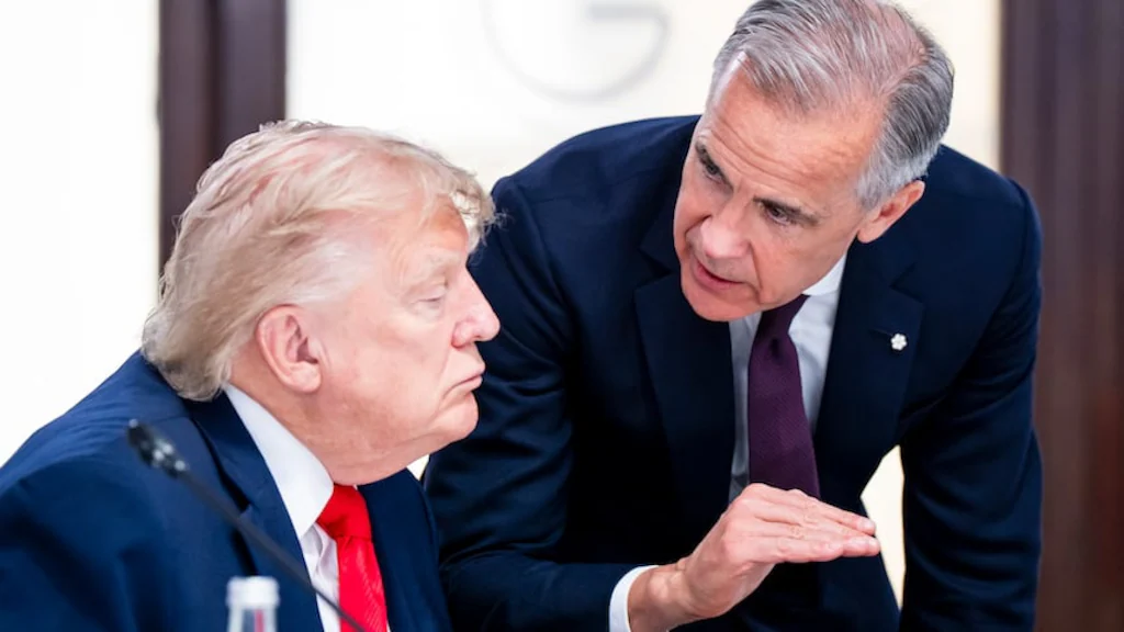 Canada's Prime Minister Mark Carney and U.S. President Donald Trump speak at a working luncheon during the G7 summit in Evian-les-Bains, France, on Tuesday, June 16, 2026.